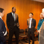 Texas Engineer Gabe Muoneke speaking to a group of people