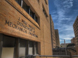 The front of the Engineering Technology Center Building highlighting the J. Mike Walker Department of Mechanical Engineering sign
