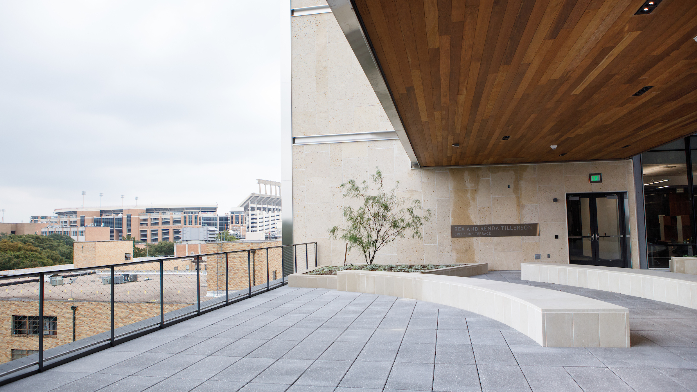 The Rex and Renda Tillerson Terrace with a view of the DKR football stadium in the background