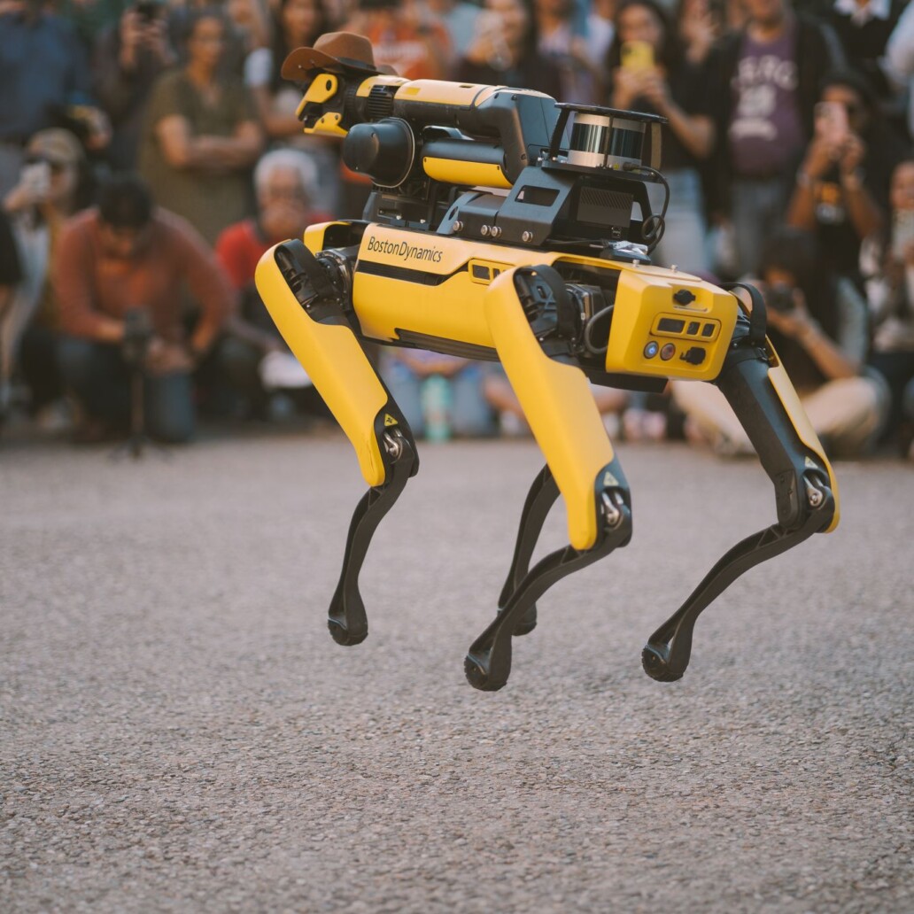 Texas Robotics robot jumping in front of crowd