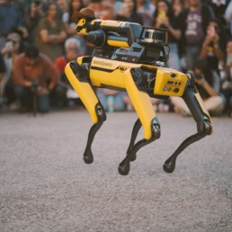 Texas Robotics robot jumping in front of crowd