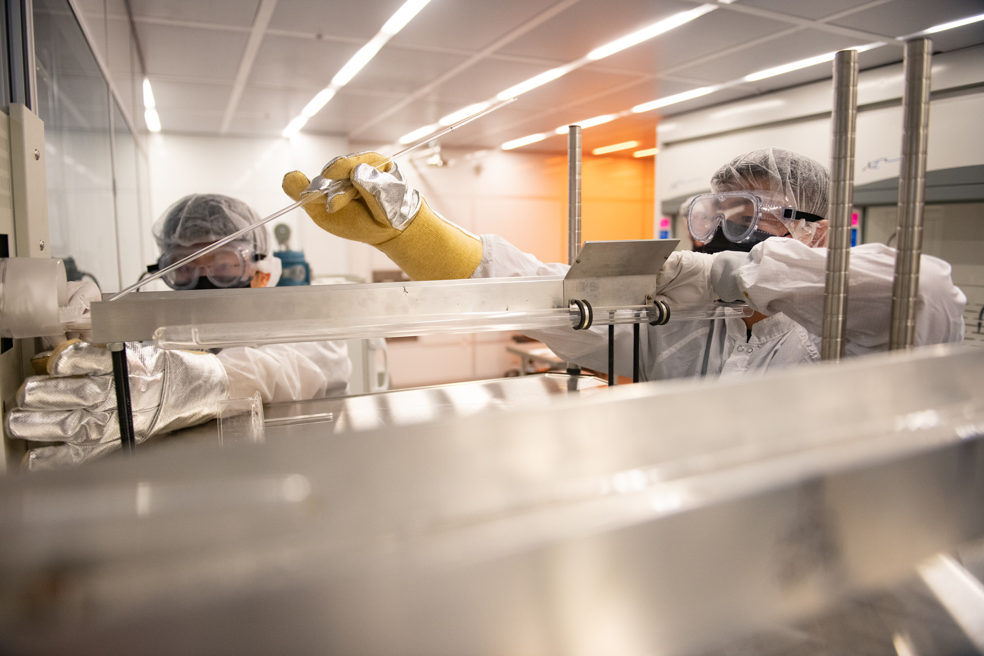 Texas Engineers in lab gear conducting research