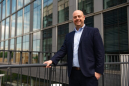 Texas Engineering chair Matt Balhoff in front of GLT building