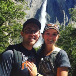 Perkins in front of waterfall