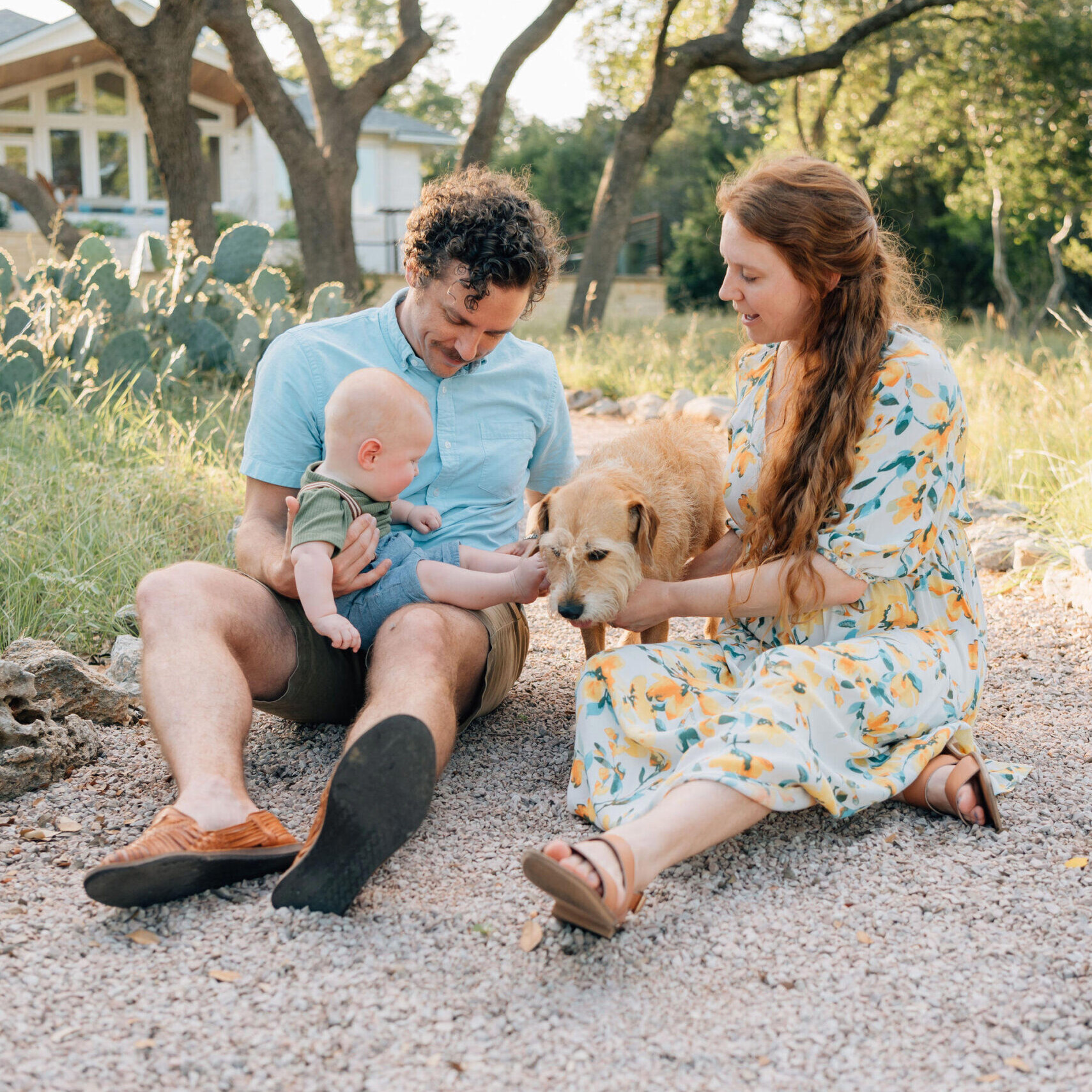 Texas Engineers Kate and Kemp Lewis sitting with their child and dog