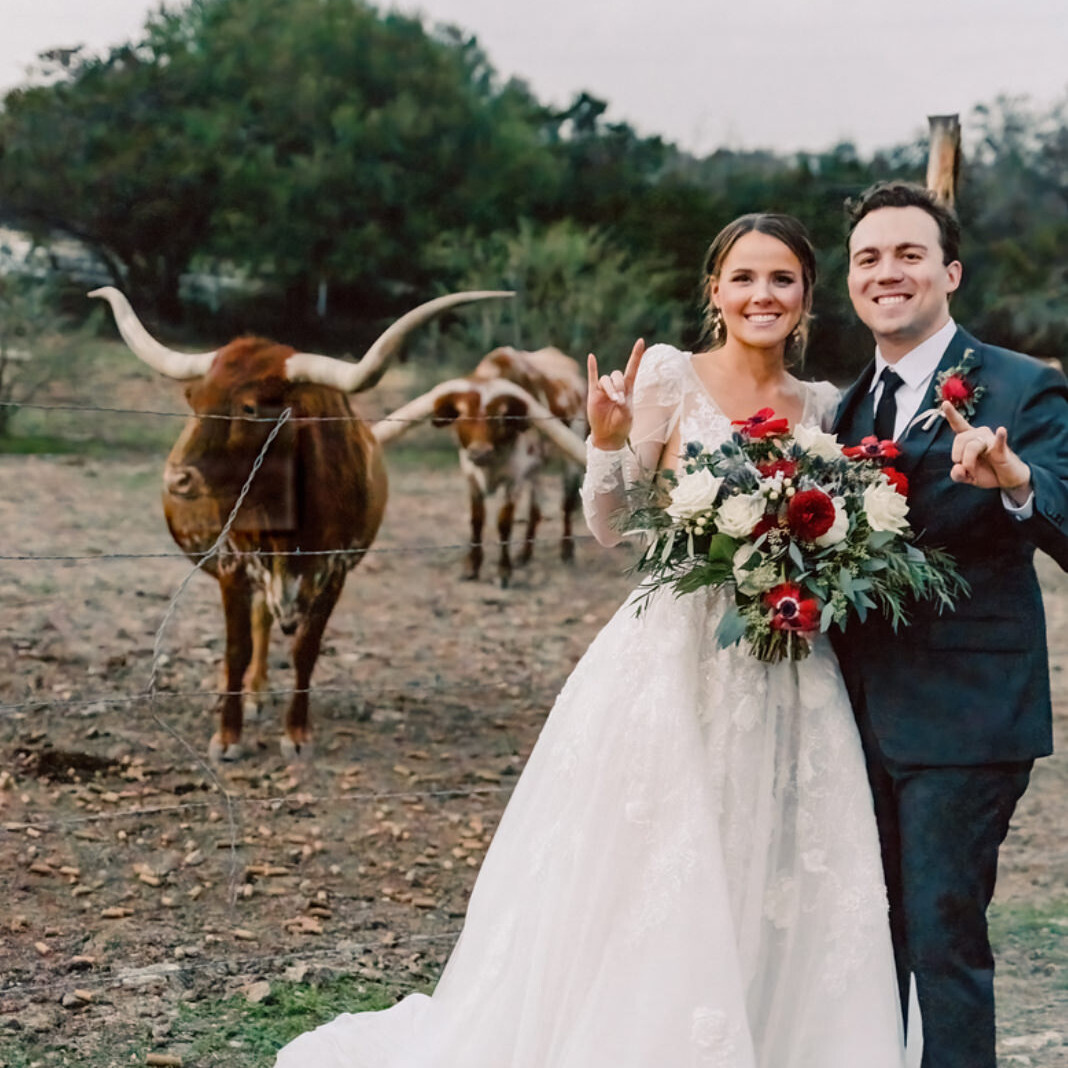 Texas Engineers Shannon Lawless and Chase Scott with longhorns at wedding