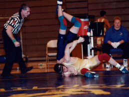 Texas Engineer Jon Slowik wrestling with opponent