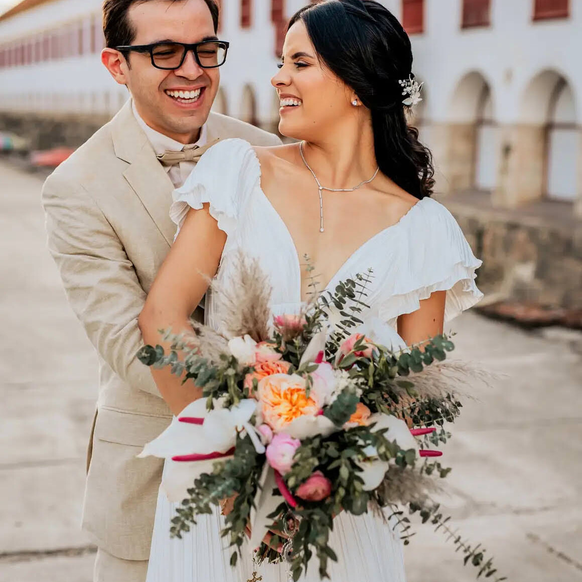 Texas Engineers Laura Rivera and Santiago Echeverri smiling on their wedding day