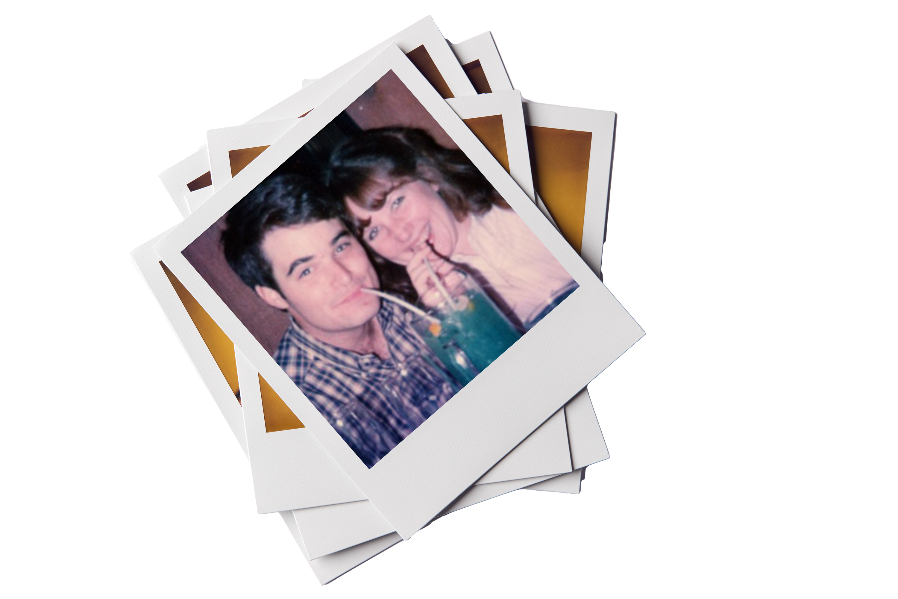 Polaroid of Texas Engineers John and Lynne Tatum sharing a drink with two straws