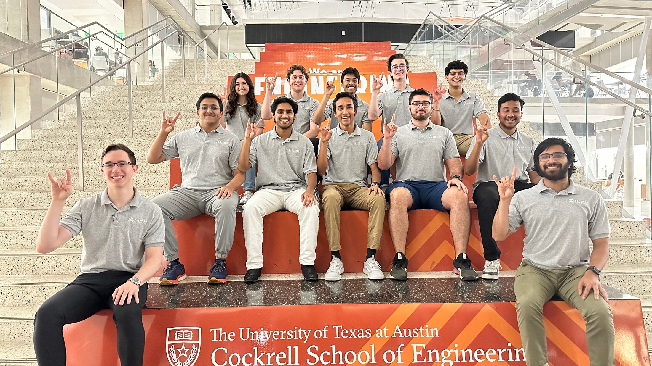 Paradigm Robotics student team smiling for photo in 2023 in EER.