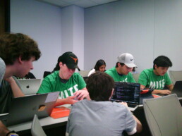 Longhorn Engineering Summer Camp counselors teaching students n classroom