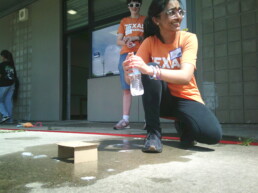 Longhorn Engineering Summer Camp counselors launching rocket.