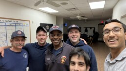 Texas Engineer Siddharth Thakur taking selfie with firefighters in fire station