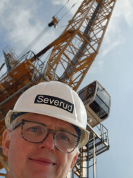 Texas Engineer Brian Falconer taking selfie on site of a construction project