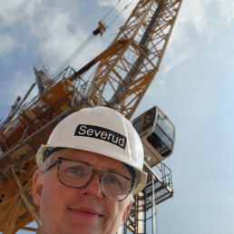 Texas Engineer Brian Falconer taking selfie on site of a construction project