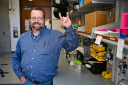 Matt Whitaker smiling in lab