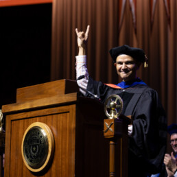 Texas Engineer Edward Figueroa speaking at podium during Commencement ceremony